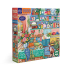Jigsaw puzzle box featuring a colorful kitchen scene with  cat and a dog. Harvest Kitchen 1000 Piece Puzzle